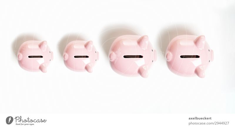 Piggy bank family Financial Industry Financial institution Business Family & Relations Pink Money box Save Accretion Luxury Colour photo Interior shot