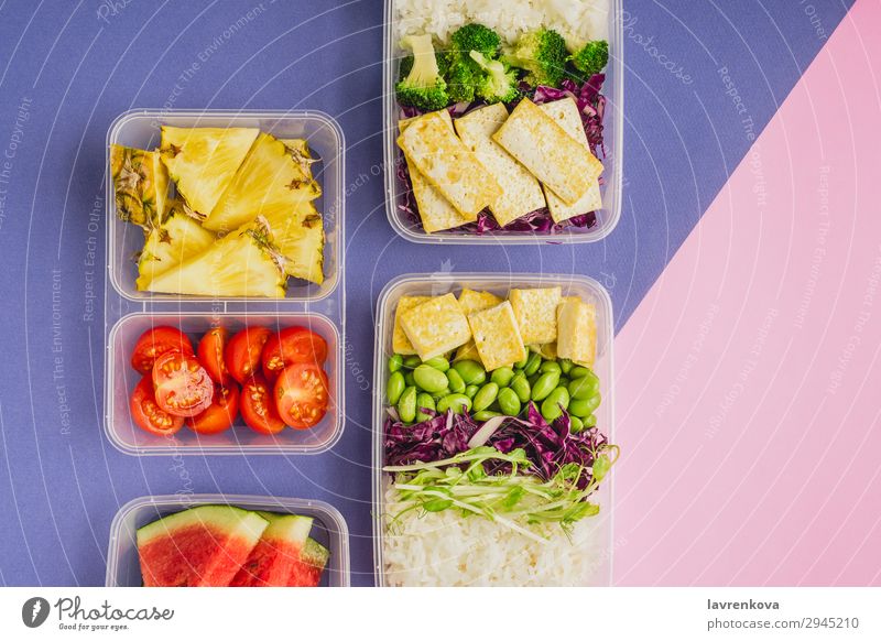 Two healthy asian-style plant-based lunch boxes knolling flatlay Asian Food Asian rice dish bento Broccoli Tomato Container Delicious Diet Dinner Dish edamame