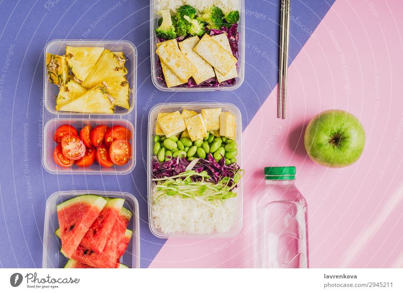 Two healthy asian-style plant-based lunch boxes knolling flatlay Asian Food Asian rice dish bento Broccoli Tomato Container Delicious Diet Dinner Dish edamame