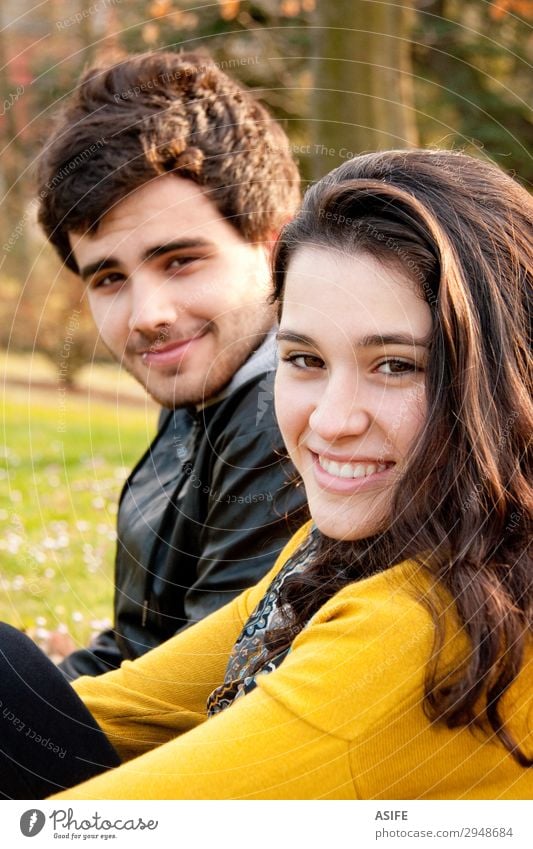 teenagers sitting in the grass Lifestyle Joy Happy Beautiful Relaxation Leisure and hobbies Human being Woman Adults Man Sister Friendship Couple