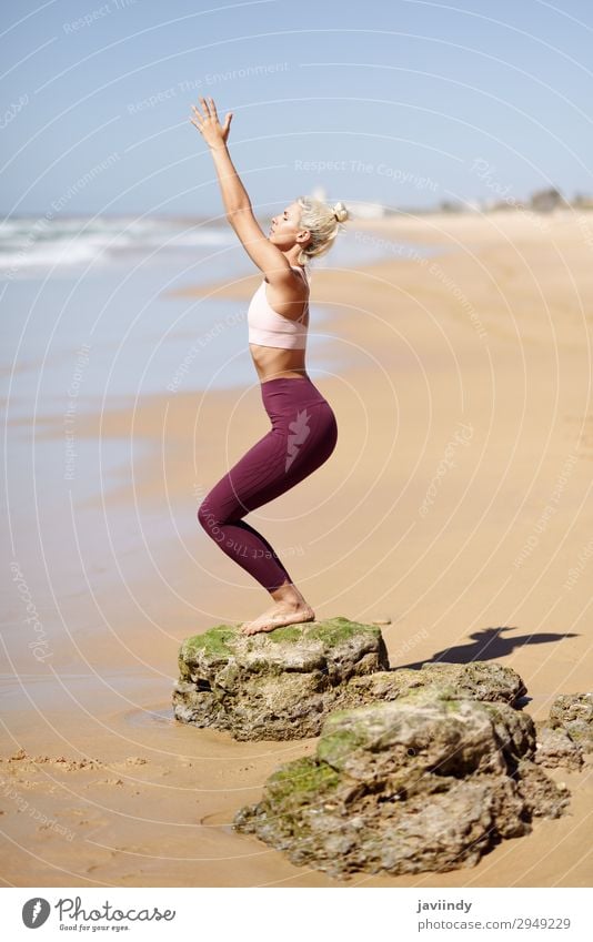 Caucasian blonde woman practicing yoga in the beach Lifestyle Beautiful Body Harmonious Relaxation Meditation Summer Beach Ocean Sports Yoga Human being