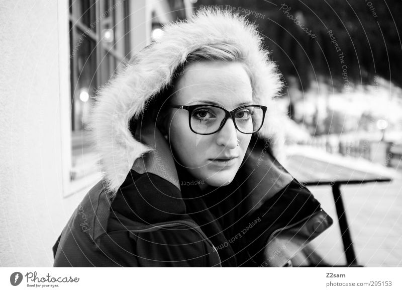 L Feminine Young woman Youth (Young adults) 1 Human being 18 - 30 years Adults Winter Snow Jacket Hooded (clothing) Piercing Eyeglasses Blonde Relaxation Sit