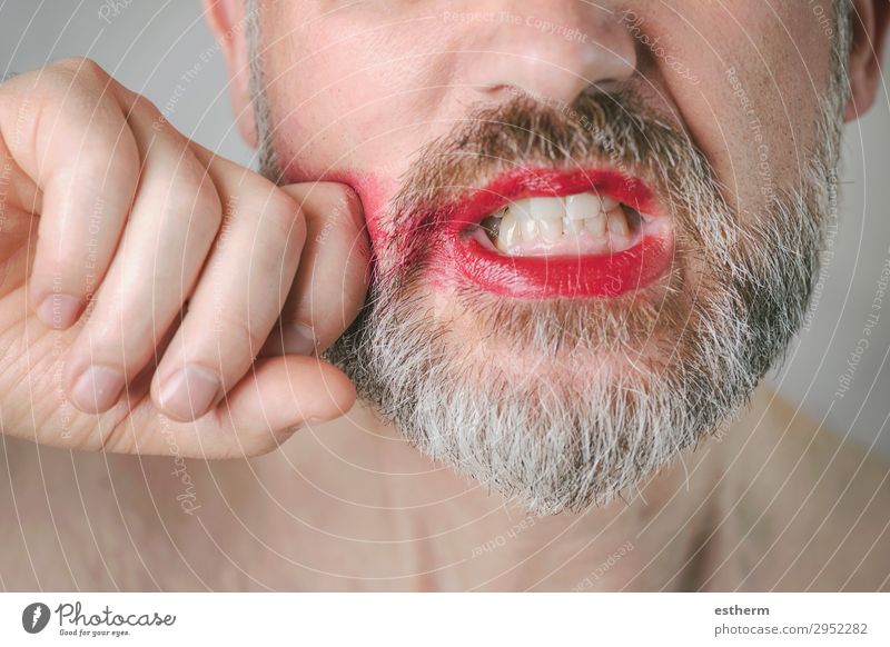 Bearded angry man with Red Lipstick on his lips Lifestyle Face Make-up Human being Masculine Homosexual Man Adults Mouth 1 30 - 45 years Fitness Aggression