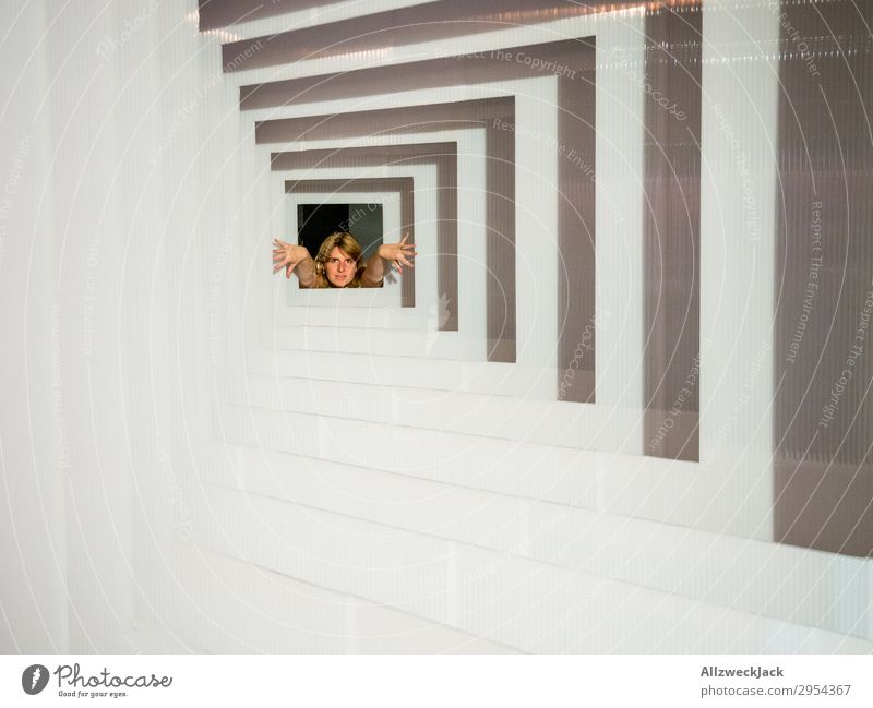 Portrait of a young woman in several frames 1 Person Young woman Portrait photograph Central perspective Frame Tunnel Interior shot Studio shot Illusion Joy