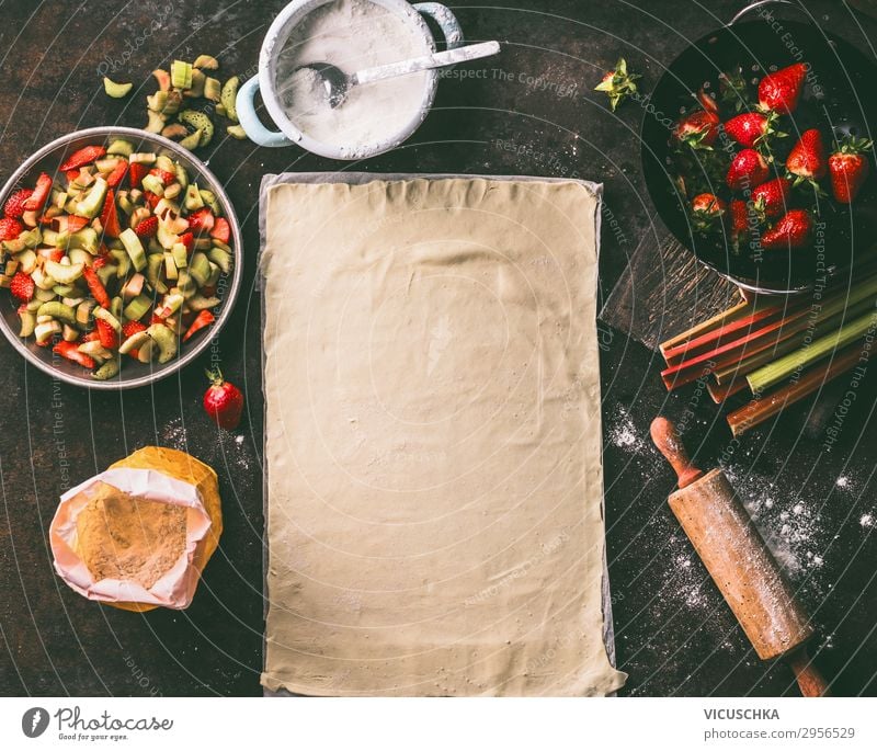 Leaf of dough with rhubarb and strawberries Food Fruit Dough Baked goods Cake Nutrition Crockery Style Design Healthy Eating Summer Living or residing Table