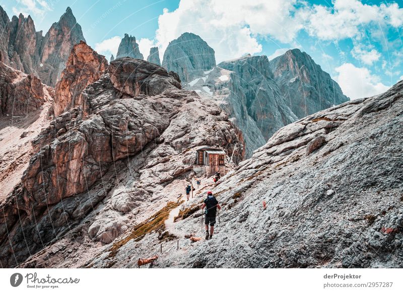 Dolomites with hiker in foreground II Adventure Hiking Beautiful weather Bad weather Fog Peak Summer Landscape Nature Environment Far-off places Freedom