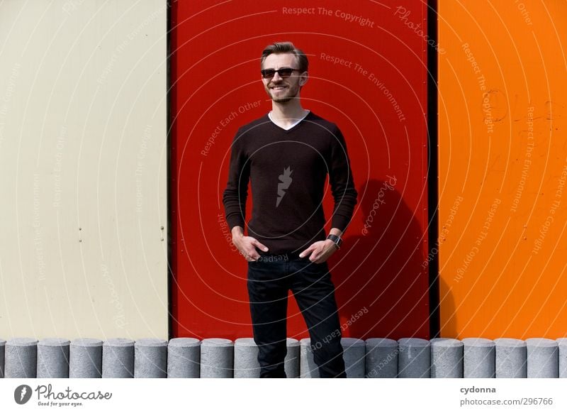 right in the middle Lifestyle Elegant Style Well-being Human being Young man Youth (Young adults) 18 - 30 years Adults Wall (barrier) Wall (building) Sweater