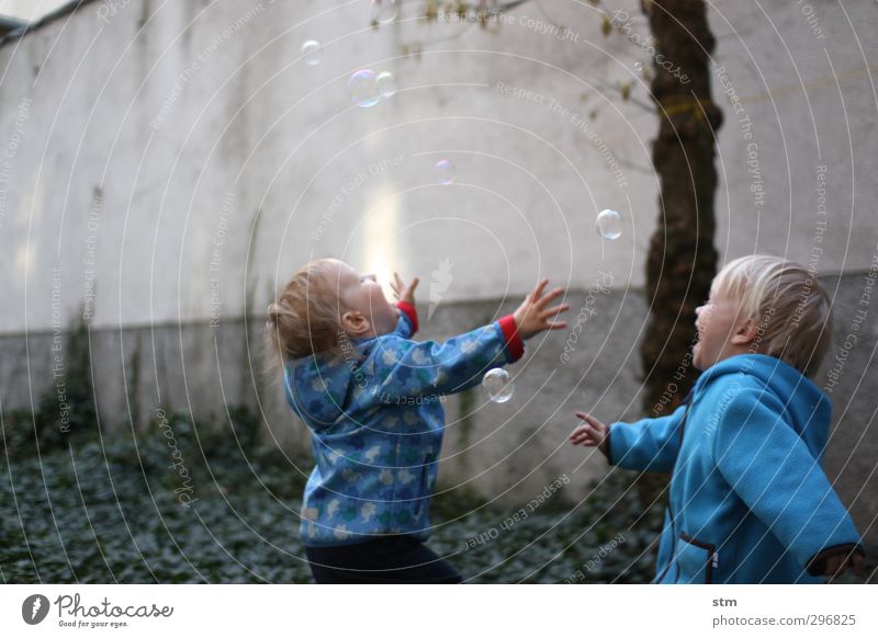 euphoria Healthy Human being Masculine Child Toddler Boy (child) Friendship Infancy 2 1 - 3 years Garden Jacket Soap bubble Playing Athletic Blue Emotions Joy