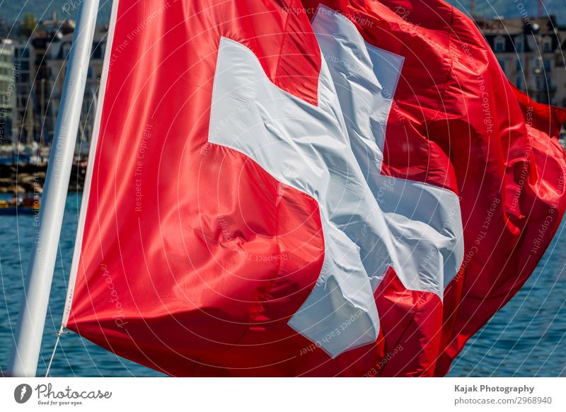 Swiss flag on Lake Geneva Sign Signs and labeling Large Red White Politics and state Switzerland Flag Exterior shot Deserted Day Long shot