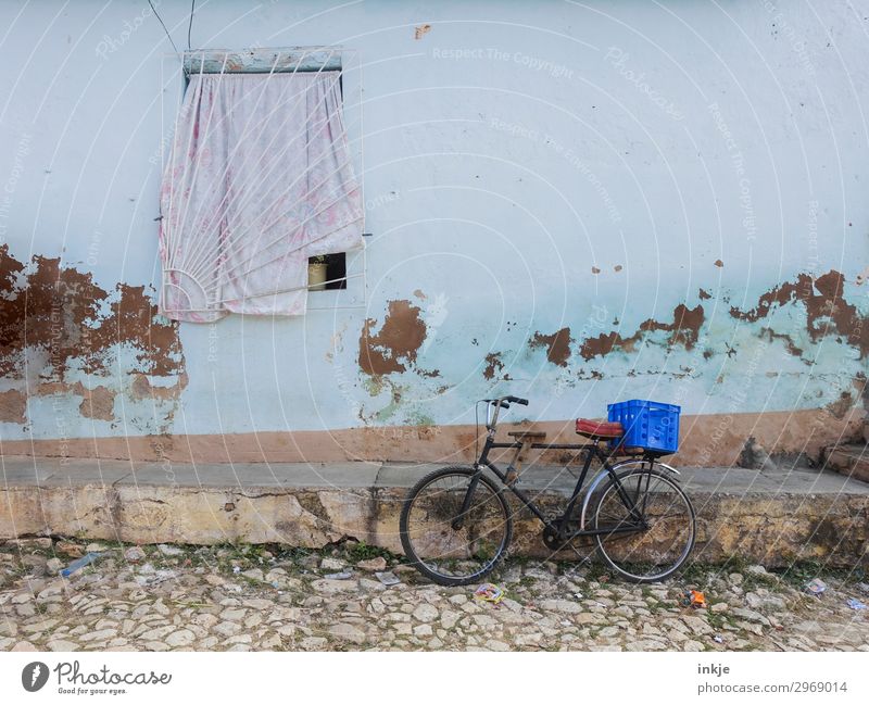 Cuban façade Village Deserted House (Residential Structure) Cobblestones Facade Window Bicycle Box Basket Old Poverty Authentic Drape Grating Flaked off Plaster