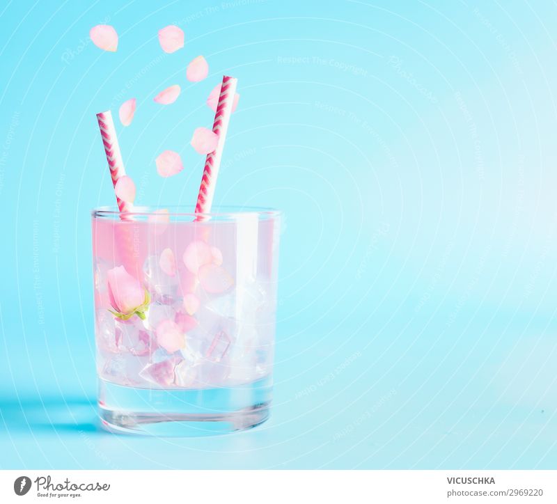 Summer drink with rose petals and flowers. Beverage Cold drink Lemonade Longdrink Cocktail Glass Style Design Table Party Restaurant Bar Cocktail bar Rose Pink