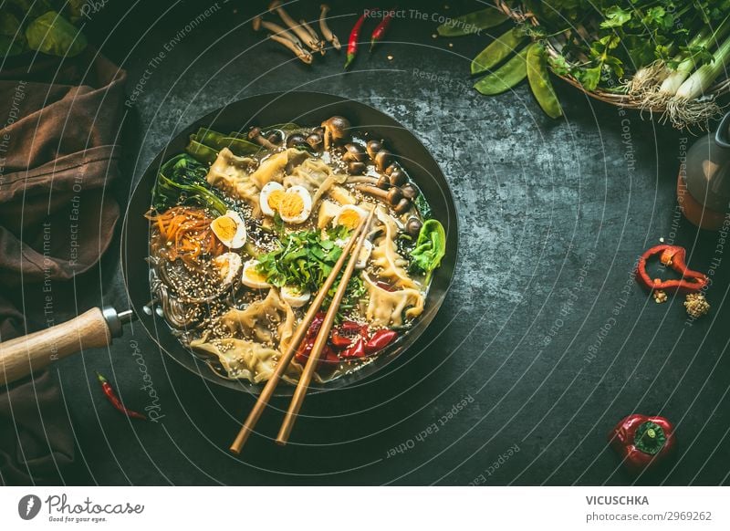Wok pan with korean stew and chopsticks Food Vegetable Nutrition Lunch Organic produce Vegetarian diet Diet Asian Food Style Healthy Eating Table Restaurant