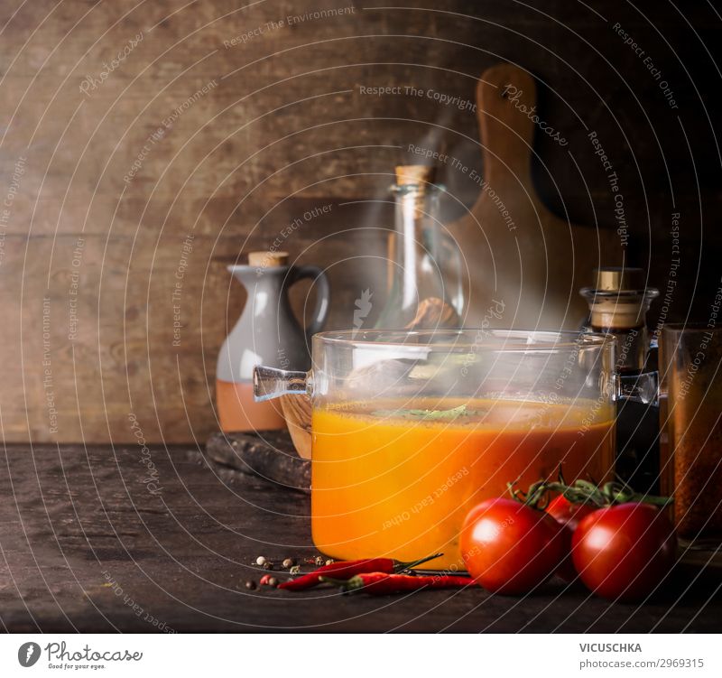 Glass saucepan with hot tomato soup Food Vegetable Soup Stew Herbs and spices Nutrition Lunch Organic produce Vegetarian diet Diet Crockery Pot Style Design