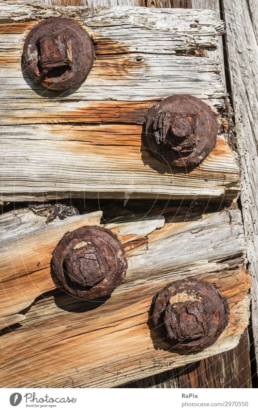 Wooden construction on an old pier. wood wooden floorboards planks Floorboards Ground built House (Residential Structure) oak wood Iron Old Ancient