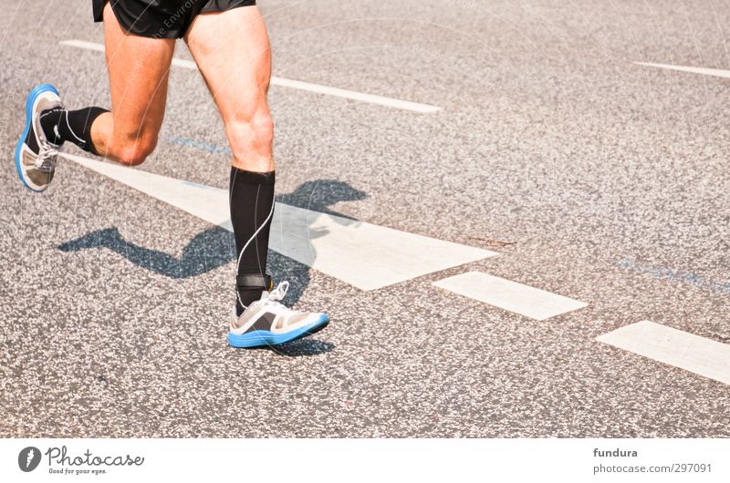 Marathon runner on asphalt. Healthy Athletic Fitness Life Sports Sportsperson Sporting event Jogging Masculine Man Adults Legs 1 Human being 18 - 30 years