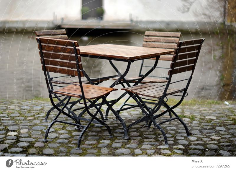 seating group To have a coffee Chair Table Restaurant Sit Garden chair Café Free Empty Outdoor furniture Sidewalk café Colour photo Exterior shot Deserted