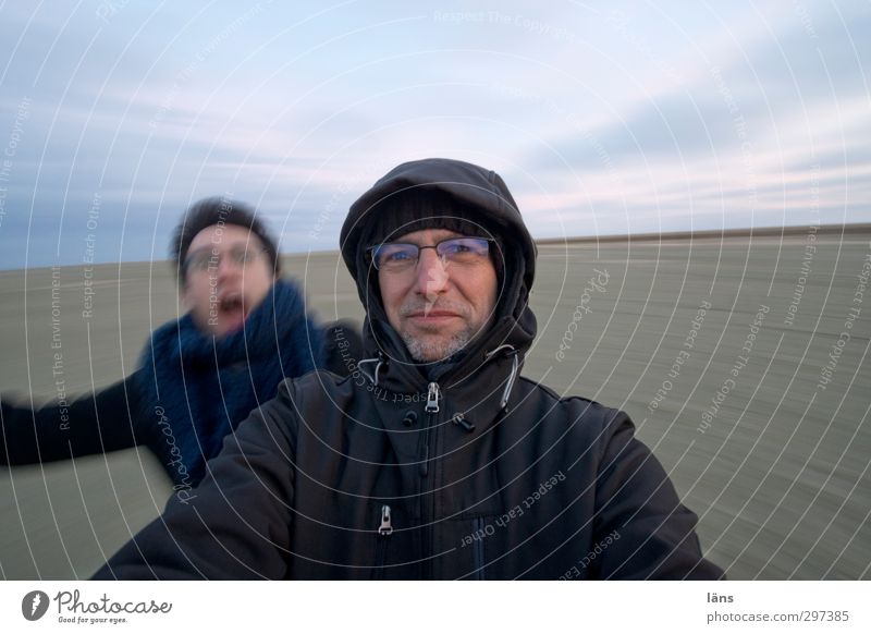Rømø | Roundabout Beach Human being Man Adults 2 Sky Horizon Sand Movement Rotate Speed Ease Exterior shot Evening Wide angle Upper body Looking into the camera
