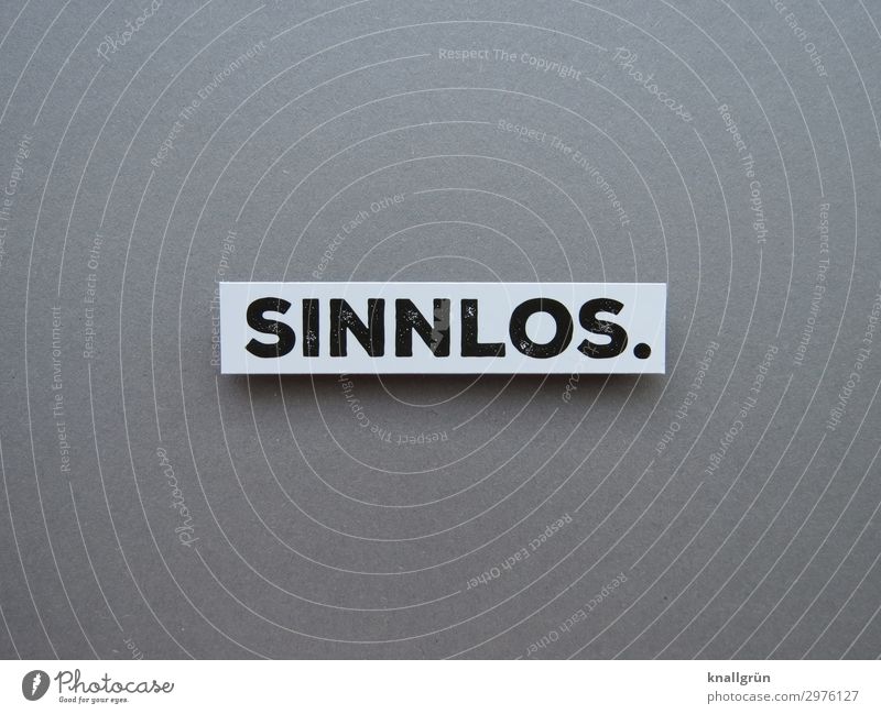 SINNLOS. Characters Signs and labeling Communicate Gray Black White Emotions Sadness Senses Futile Free of charge Useless Cheap superfluous Colour photo
