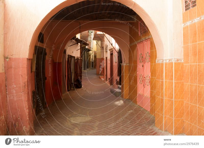 Archway in an alley in the old city of Tangier in Morocco House (Residential Structure) Wall (barrier) Wall (building) Door Cool (slang) Orange Red Romance