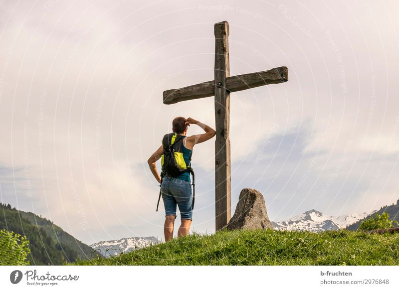 Summit cross, woman with rucksack Contentment Relaxation Adventure Far-off places Freedom Summer Mountain Hiking Woman Adults 1 Human being 30 - 45 years Clouds