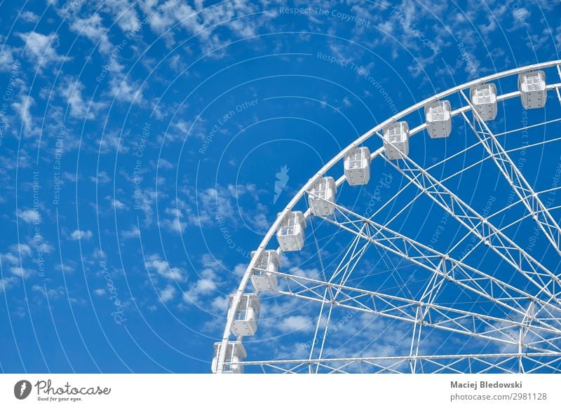 Picture of a Ferris wheel against the blue sky. Joy Leisure and hobbies Summer Entertainment Sky Rotate To enjoy Tall Blue White Joie de vivre (Vitality)