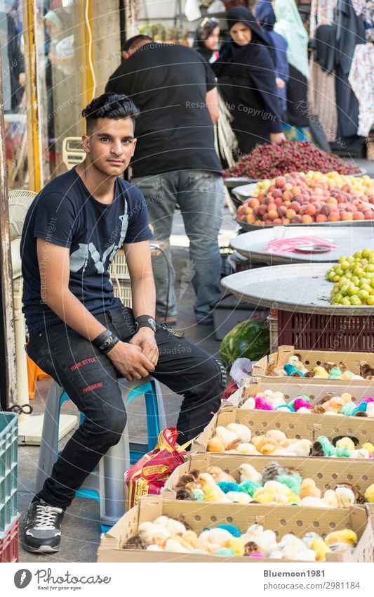 Portrait of a young man brought baby chicks for sale Fruit Lifestyle Shopping Tourism City trip Summer Easter Work and employment Profession Business