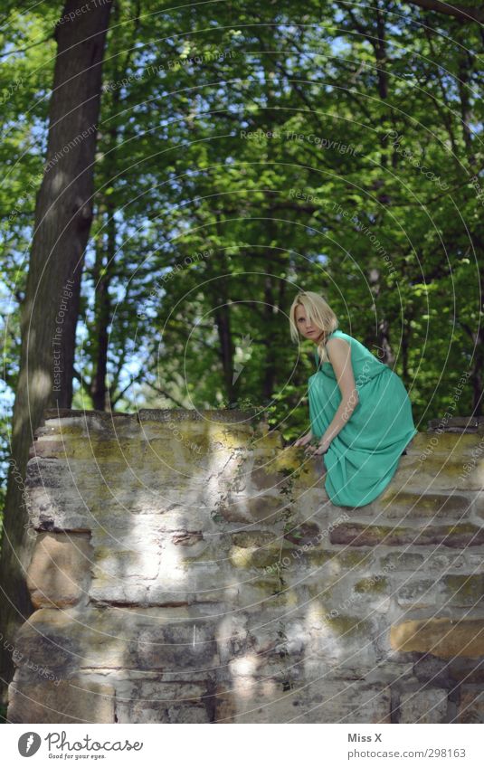 green fairy Human being Feminine Young woman Youth (Young adults) 1 18 - 30 years Adults Summer Tree Forest Wall (barrier) Wall (building) Dress Blonde Sit Tall