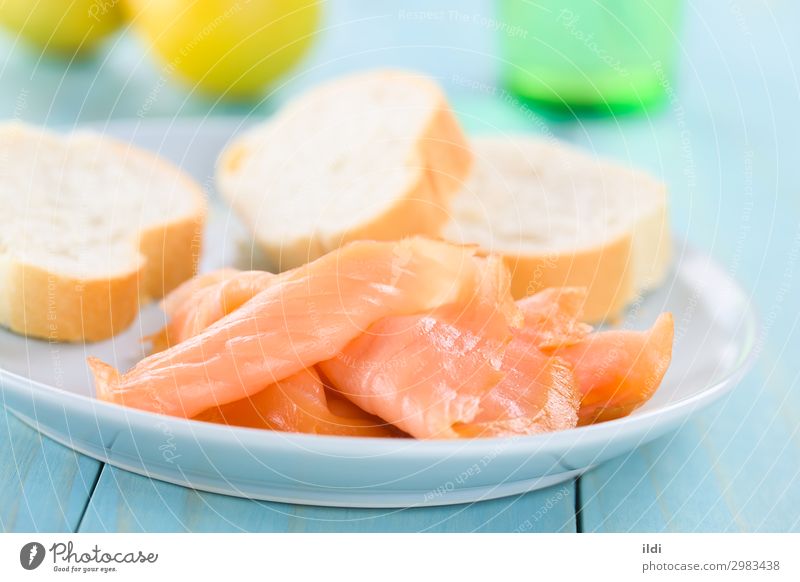 Smoked Salmon Slices Fish Seafood Breakfast Healthy Sliced Gourmet Delicacy Snack Baguette Meal Fat omega 3 filet fillet appetizer cured on blue Horizontal