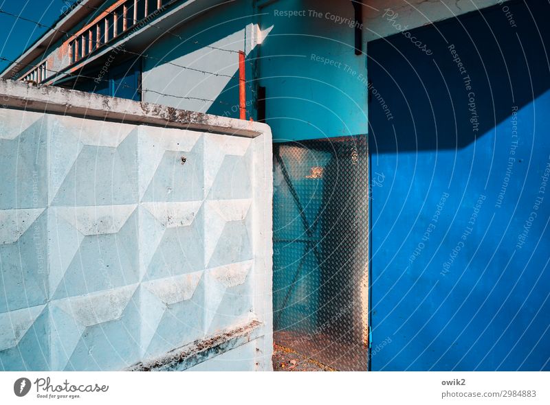Zossen, Brandenburg Wall (barrier) Wall (building) Facade Gloomy Blue Black White Concentrate Stagnating Corner Secrecy Colour photo Exterior shot Pattern