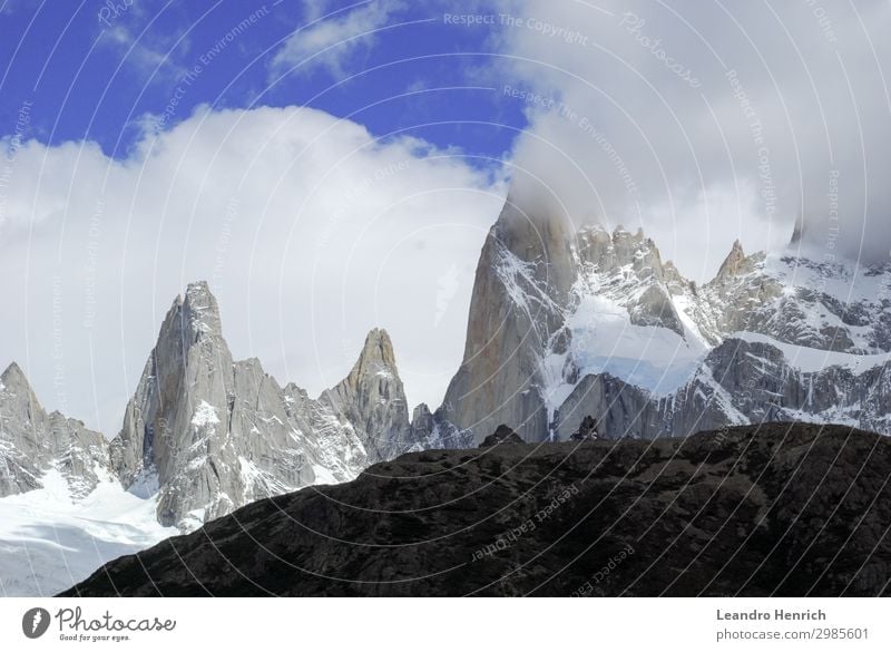 The Mount Fitz Roy in the gold hour over the blue sky Vacation & Travel Tourism Summer Snow Mountain Hiking Nature Landscape Sky Clouds Wind Rain Rock