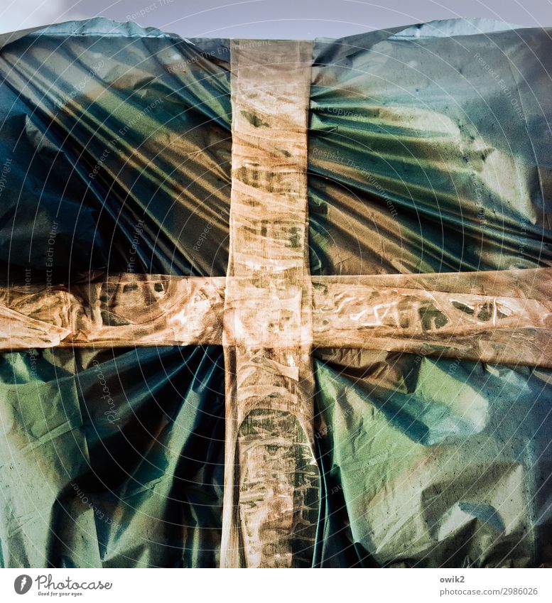 cross Package Covers (Construction) adhesive tape Connect corded Wrinkles Crucifix Trashy Colour photo Exterior shot Detail Structures and shapes Deserted