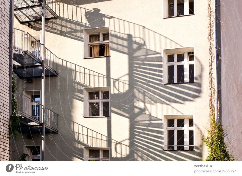 Man on the spiral staircase House (Residential Structure) Apartment Building Tower block Apartment house Living or residing Residential area Town Berlin