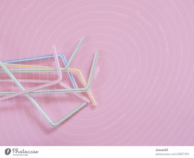 Plastic straws on pink background with copy space Beverage Drinking Juice Straw Design Joy Feasts & Celebrations Environment Tube Fresh Pink Red Flexible Colour