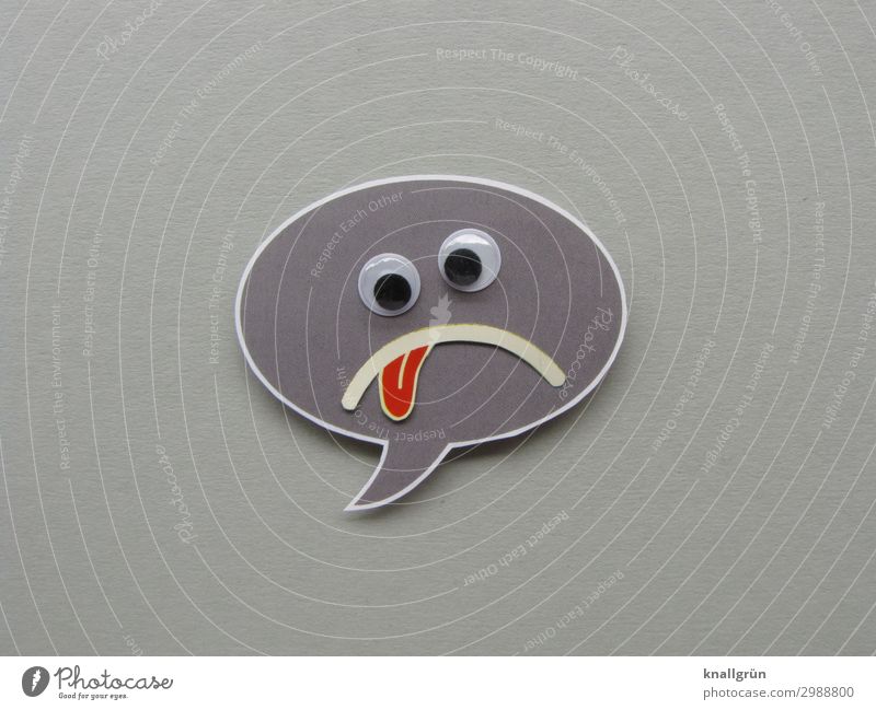 Sad Smiley Sign Communicate Sadness Gray Red White Emotions Saucer-eyed Tongue Colour photo Studio shot Deserted Copy Space left Copy Space right Copy Space top