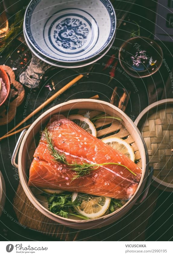 Salmon fillet in asian bamboo steamer pot Food Fish Herbs and spices Nutrition Lunch Organic produce Vegetarian diet Diet Asian Food Crockery Style Design