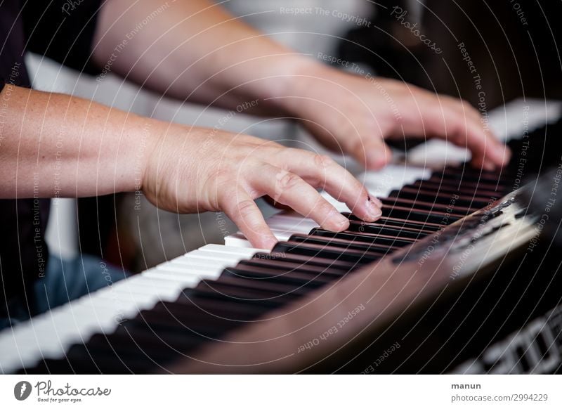 Play it again, Sam. Lifestyle Music Feasts & Celebrations Wedding Parenting Education Adult Education Music tuition Musician Masculine Man Adults Hand Fingers 1