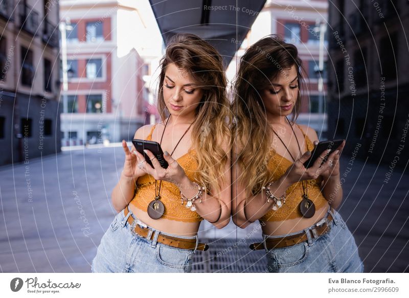 young blonde beautiful woman at the street using mobile phone Lifestyle Happy Beautiful Leisure and hobbies Summer To talk Telephone Cellphone PDA Technology