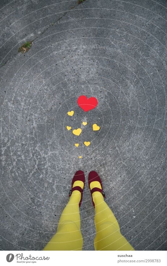 love(s) greetings Heart Sincere Red Yellow Love Friendship Compassion Connectedness Many Legs Feet Woman feminine Street Asphalt Whimsical Communication embassy