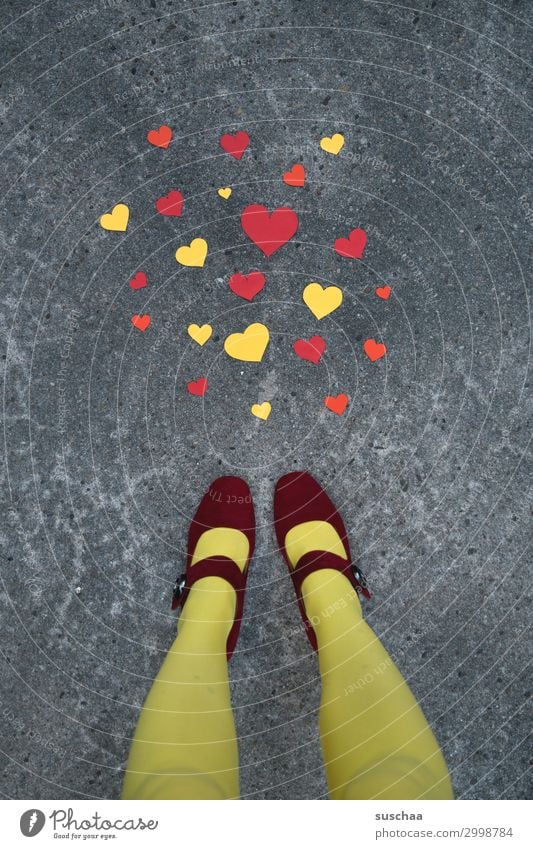 warmly ... Heart Sincere Red Yellow Love Friendship Compassion Connectedness Many Legs Feet Woman feminine Street Asphalt Whimsical Communication embassy
