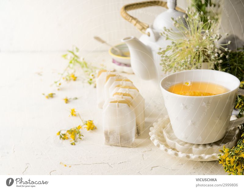 Tea cup with herbal tea tea bags Food Nutrition Breakfast Beverage Hot drink Style Design Healthy Eating Living or residing Blossom Yellow Health care
