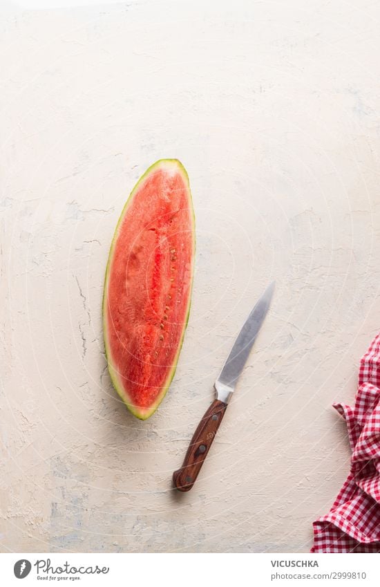piece of watermelon on white table with knife Food Fruit Nutrition Knives Design Healthy Eating Summer Background picture Water melon Part Table Food photograph