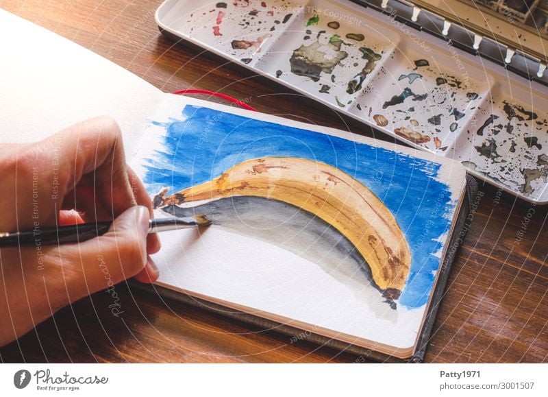 Banana in watercolour Fruit Leisure and hobbies Painting (action, artwork) Hand 1 Human being 18 - 30 years Youth (Young adults) Adults 30 - 45 years Art Artist