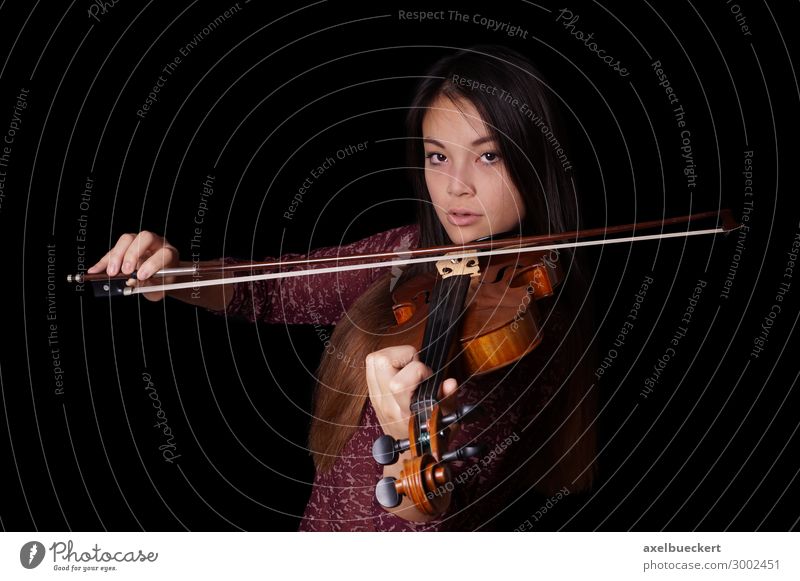 young Asian plays violin Lifestyle Leisure and hobbies Music Human being Feminine Young woman Youth (Young adults) Woman Adults 1 13 - 18 years 18 - 30 years