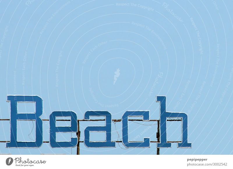 beach Vacation & Travel Tourism Summer Summer vacation Beach Sky Cloudless sky Waves Coast Ocean Steel Rust Plastic Characters Signs and labeling Line Blue