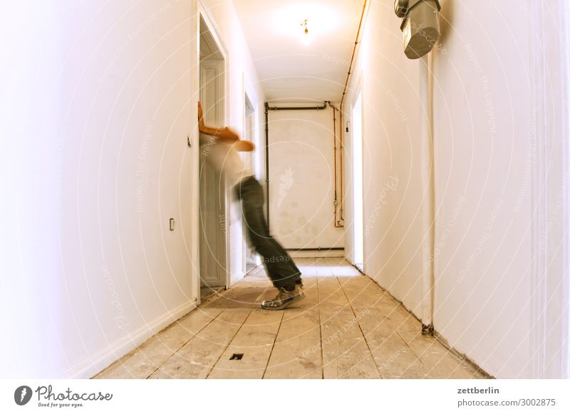 sickness Old building Period apartment Motion blur Hallway Wooden floor Floor covering Man Wall (barrier) Human being Room Interior design Copy Space Stage play