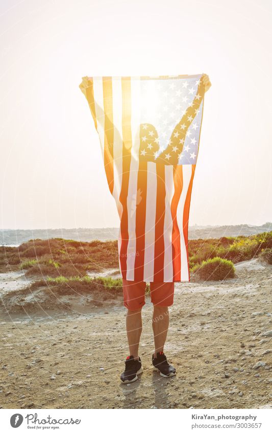 Silhouette of man with American Flag Lifestyle Joy Freedom Feasts & Celebrations Man Adults Stripe Stand Authentic Happiness Honor Pride Independence