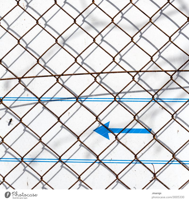 Rear left Wall (barrier) Wall (building) Fence Line Arrow Blue Gray White Communicate Left Direction Colour photo Exterior shot Pattern Deserted Copy Space left