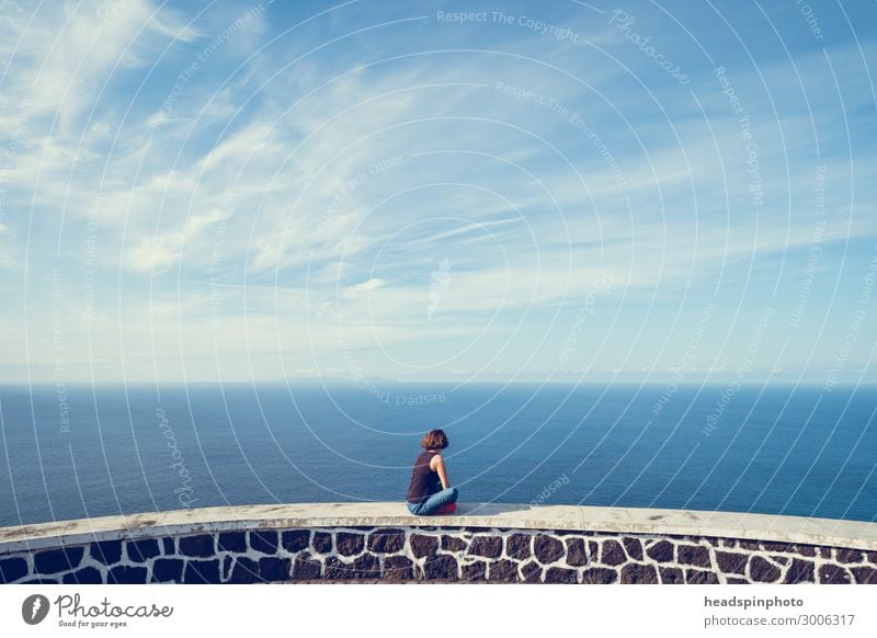 Young woman looking at sea and sky in the Azores Nature Landscape Elements Air Water Sky Clouds Beautiful weather Coast Sao Jorge Portugal Emotions Happy