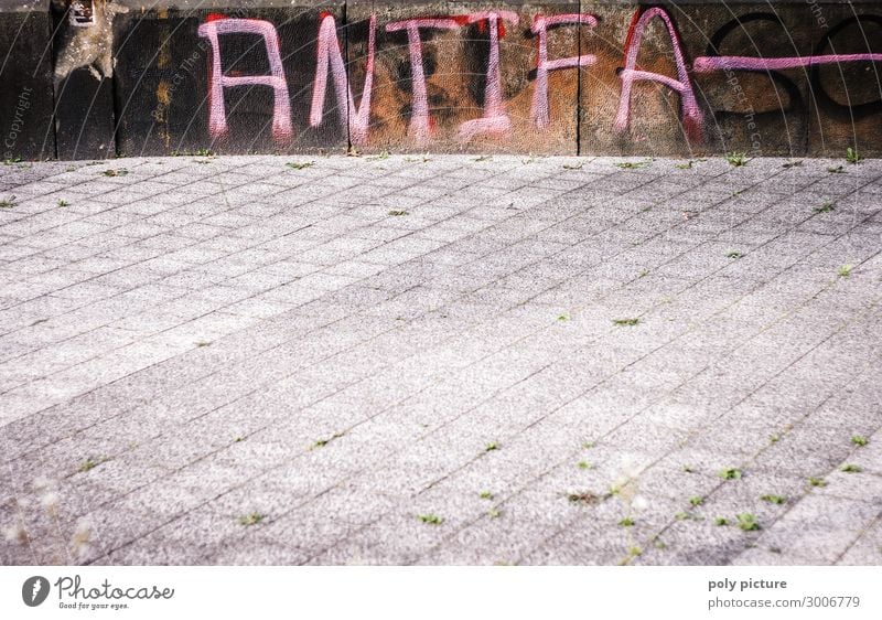 "Antifa" graffiti on a wall Town Downtown Sign Graffiti Aggression Fear Sidewalk Politics and state Political movements Anti-fascism Letters (alphabet)