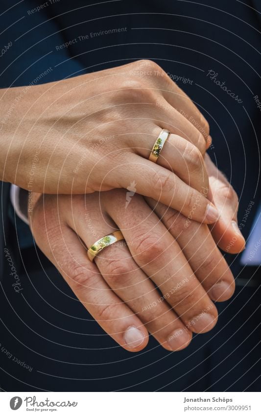 Hands of the wedding couple with wedding rings Lifestyle Joy Happy Contentment Feasts & Celebrations Wedding Human being Parents Adults Family & Relations